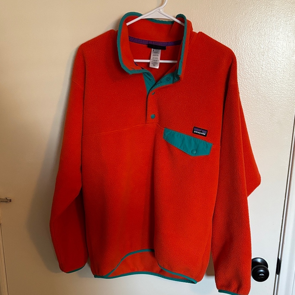 Patagonia Vibrant Orange Fleece with Teal Details